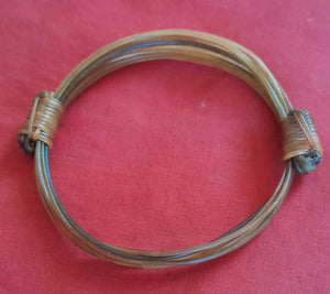 JEW6 White/orange elephant hair bracelet 4" max diameter