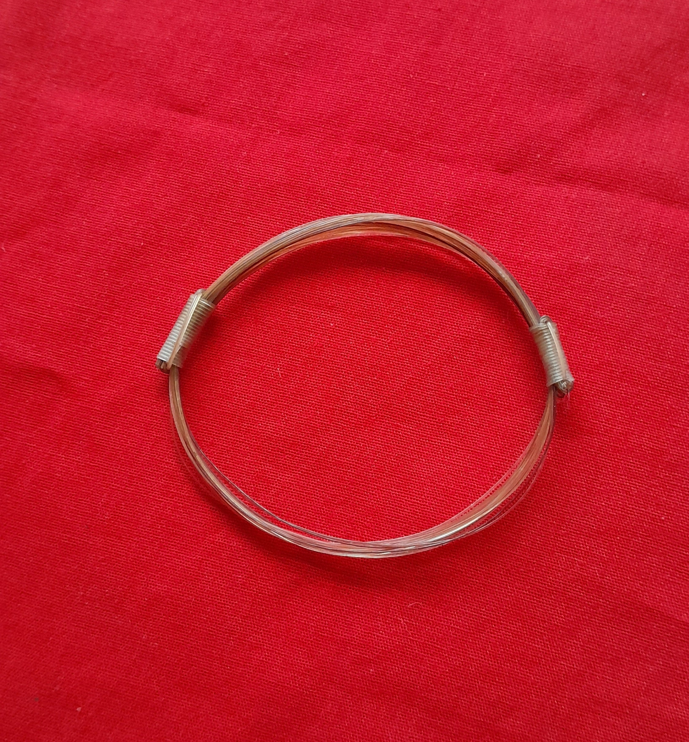 GIR16 Genuine off white giraffe hair bracelet with white knots.