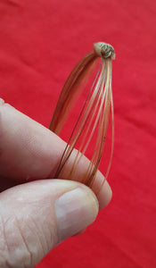 GIR16 Genuine off white giraffe hair bracelet with white knots.
