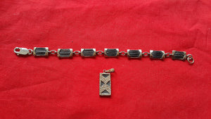 SE3 Set 18ct gold bracelet and pendant with genuine elephant hair