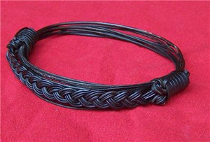 The "Francis Cary" unique 7 hair bracelet combines both braided and straight elephant hair in a traditional "hair-only" design to make a most-striking statement on your wrist. - JEAR4
