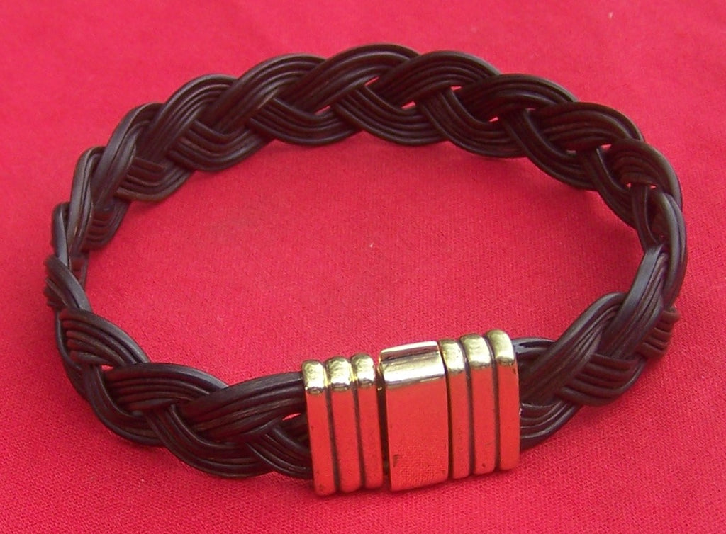 The elephant is used as a symbol of love, nurturing and motherhood throughout the ages. This hand-woven braided elephant hair bracelet would be a proud gift to a strong parent. - ME6